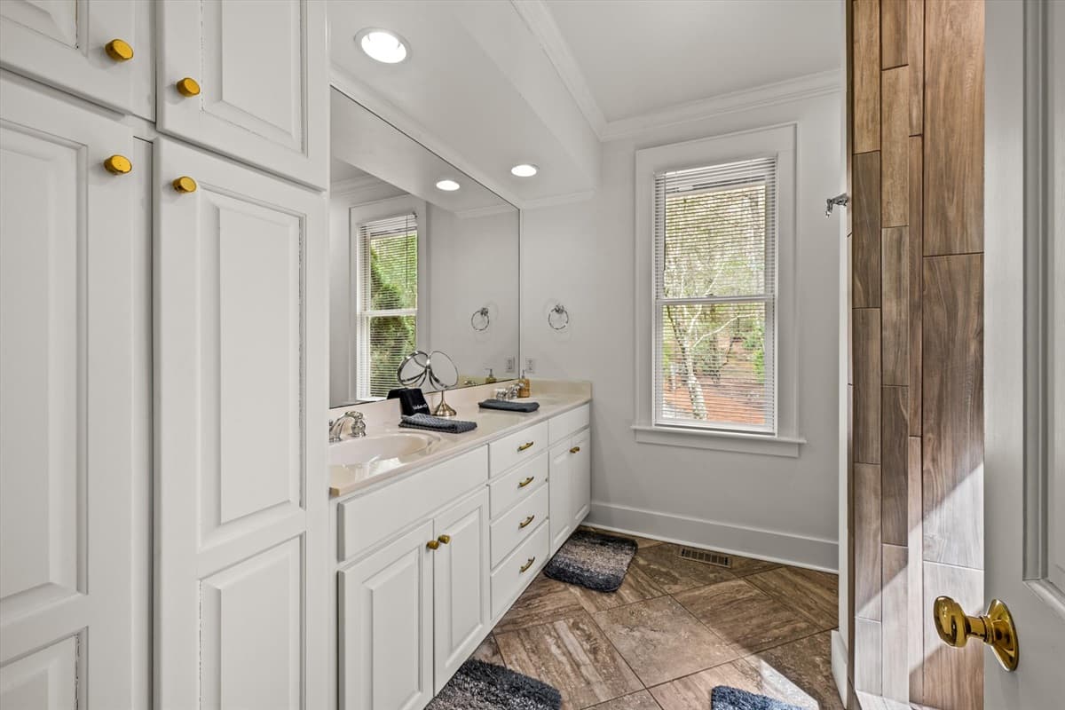 Double Sink Vanity with a Large Mirror, Bright Lights and Tons of Storage