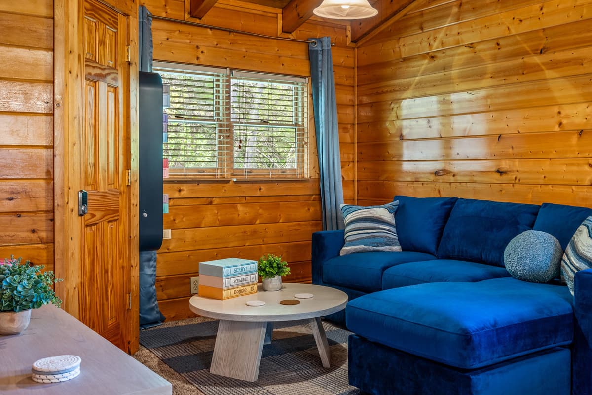 Settle in for a cozy movie night in this inviting TV area with a sleeper sofa.