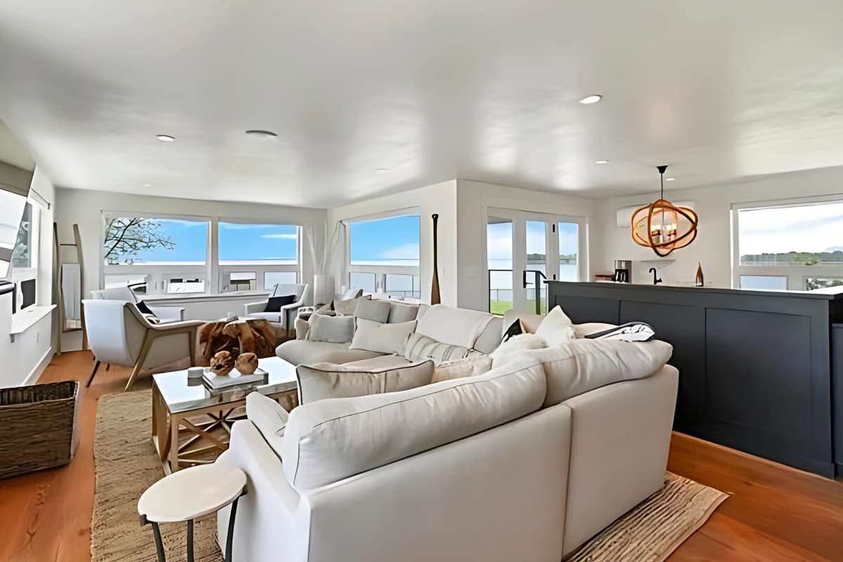 Gather together in the spacious living room, where comfortable seating creates an inviting place to relax.