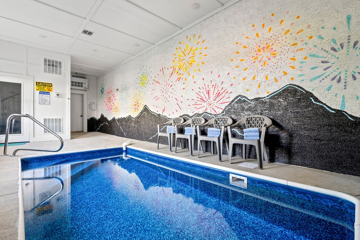 Make a splash in the indoor heated pool, surrounded by festive fireworks-themed wall art!
