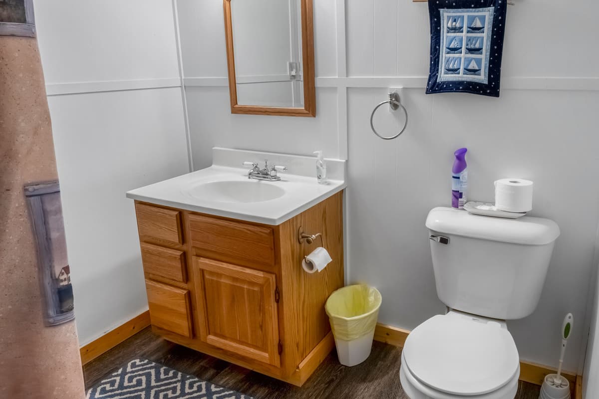 The full bathroom offers a clean, comfortable space to freshen up and get ready for the day.