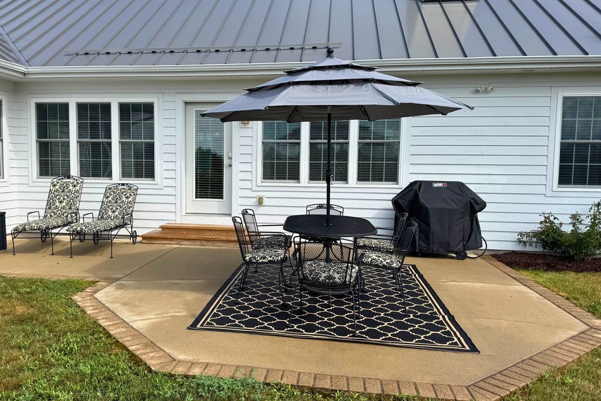 An outdoor grill is also available, making it easy to cook and enjoy fresh meals right on the patio.