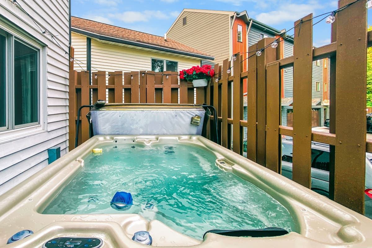 Unwind in the private hot tub and enjoy a relaxing soak after a day of exploring Sister Bay and Door County.