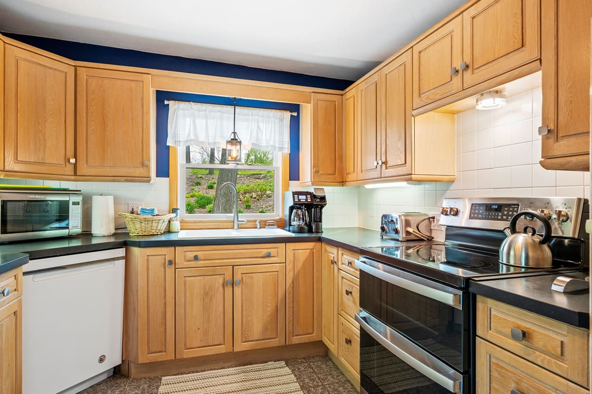 The spacious kitchen is well-equipped with everything you need to prepare meals during your stay.