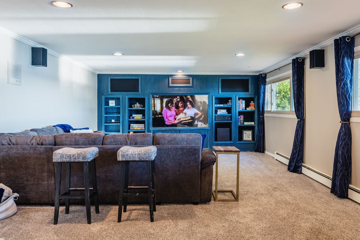 A large TV provides the perfect setup for movie nights, watching your favorite shows, or catching up on the big game. Comfortable seating gives everyone plenty of room to settle in and enjoy the space.