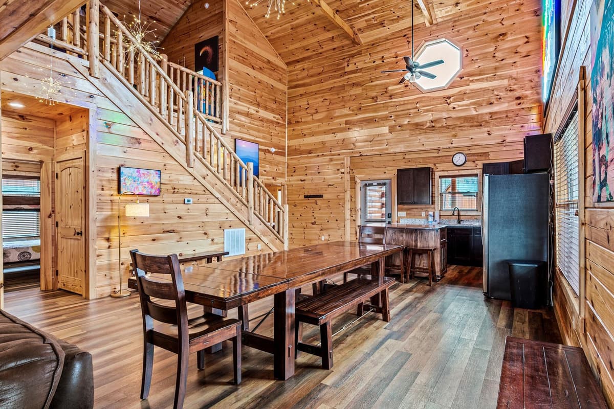 The seamless layout connects the living room, dining area, and kitchen for an inviting flow.