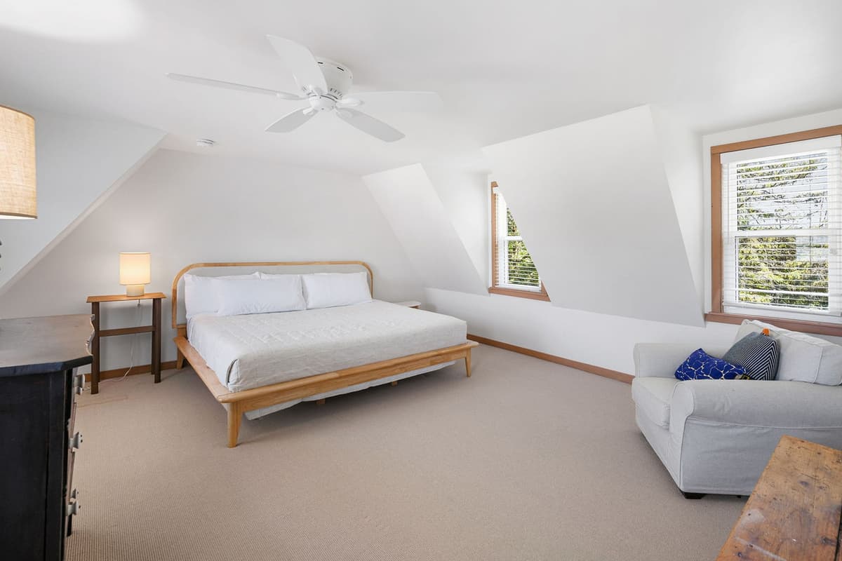 Rest easy in the inviting king bedroom, designed with comfort and relaxation in mind.
