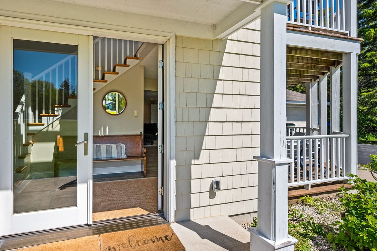 Welcome home to your Door County getaway! The main entry offers a warm and inviting first impression as you step inside.