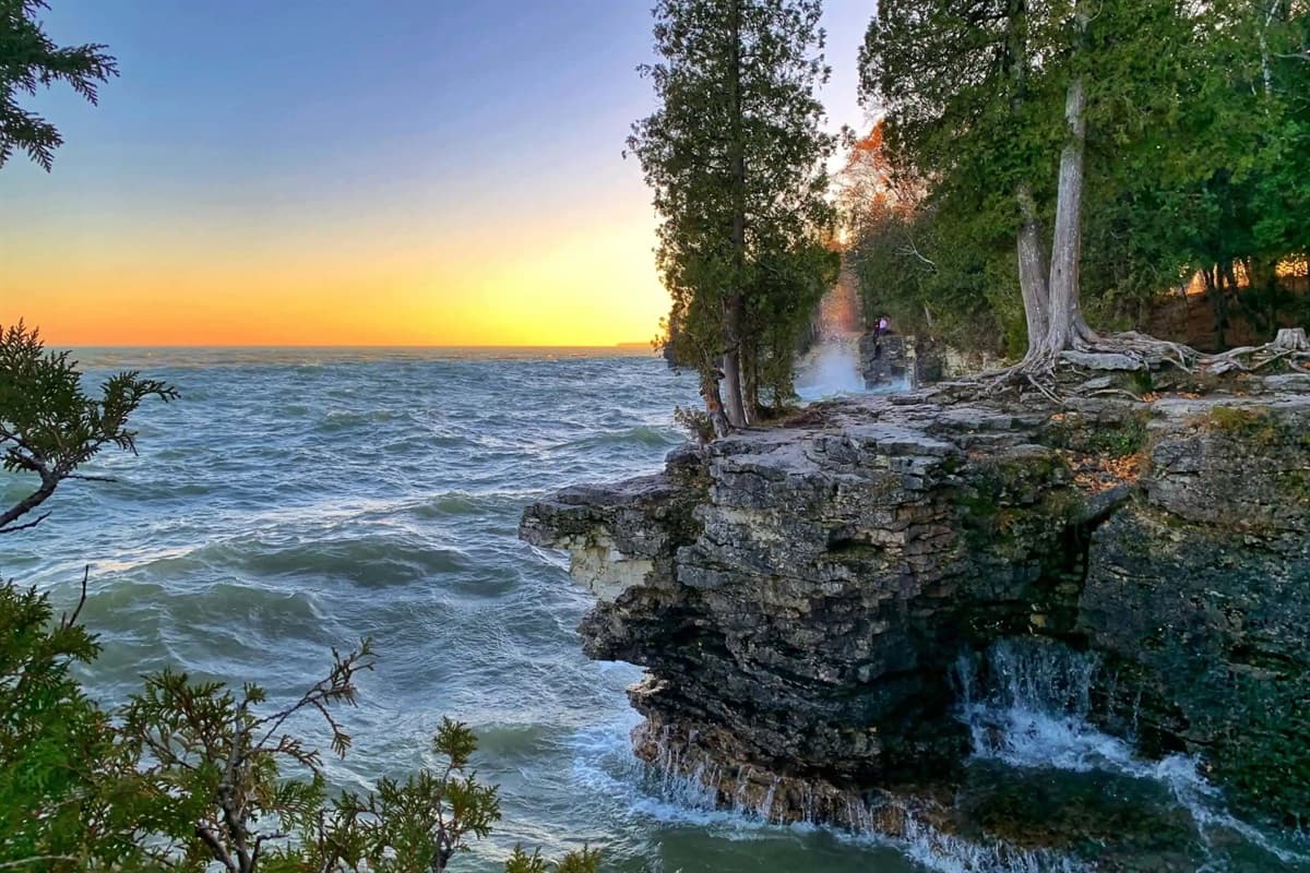 Discover the natural wonders of Cave Point County Park, where towering limestone cliffs and the crashing waves of Lake Michigan offer an unforgettable scenic experience!