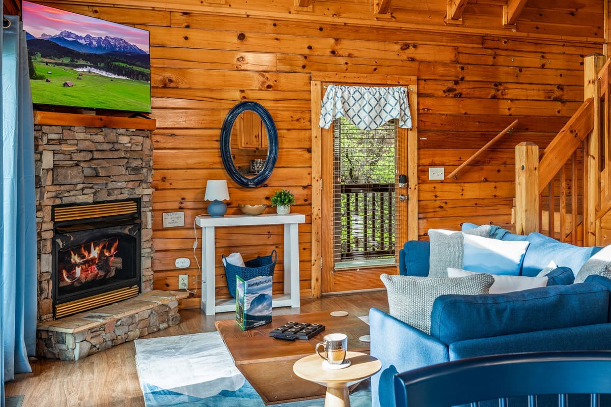 Curl up on the sofa, turn on your favorite show, and let the glow of the fireplace set the mood.