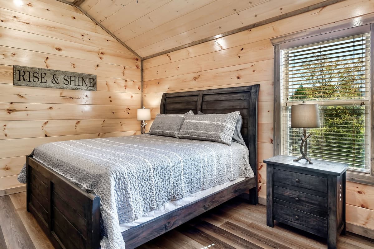 Settle into a cozy queen bedroom designed with comfort and relaxation in mind.