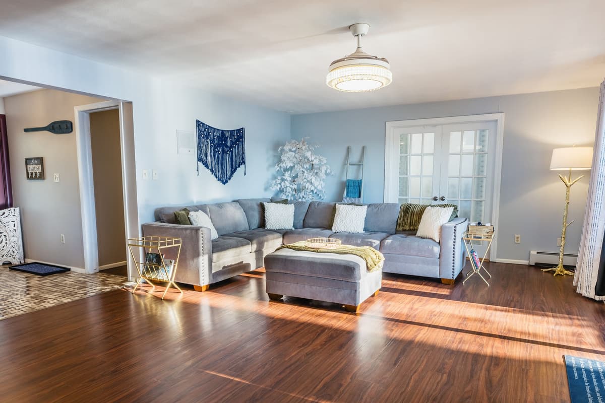 Enjoy the spacious and inviting living area, featuring comfortable seating where you can gather with family and friends.