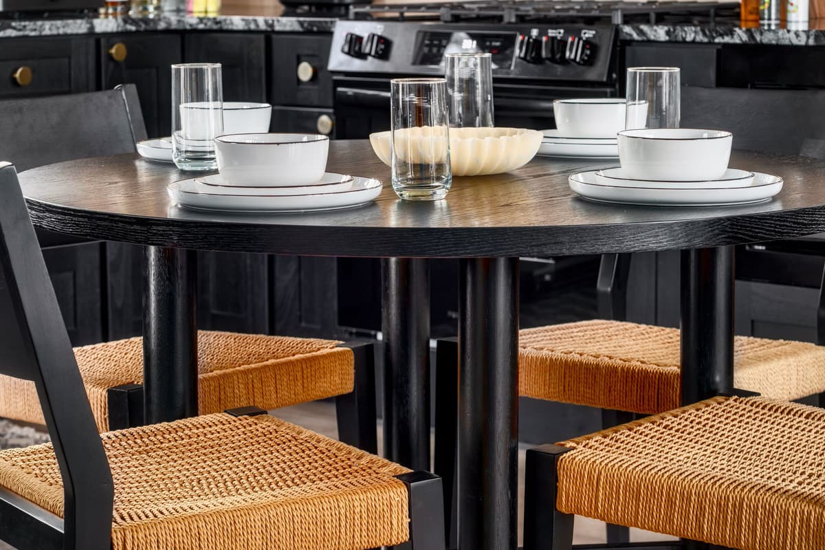 The table provides plenty of space for a relaxed breakfast before heading out to explore the Smoky Mountains, a casual lunch, or a cozy dinner after a day of adventure.