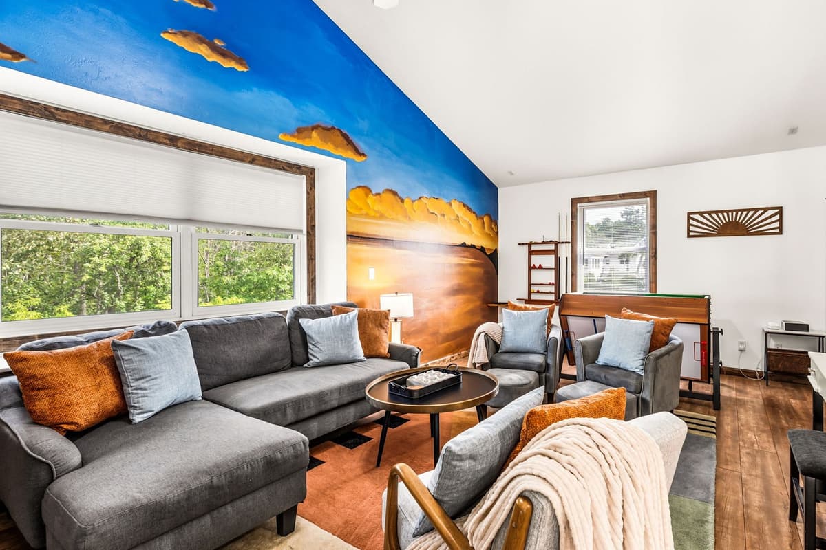 The room includes a cozy living area where guests can relax, read, or spend time together.