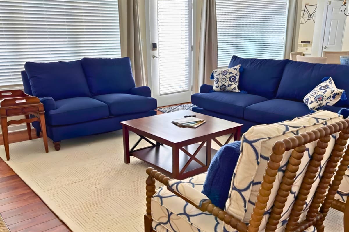 New loveseat and coffee table added for more comfortable seating in the living room.