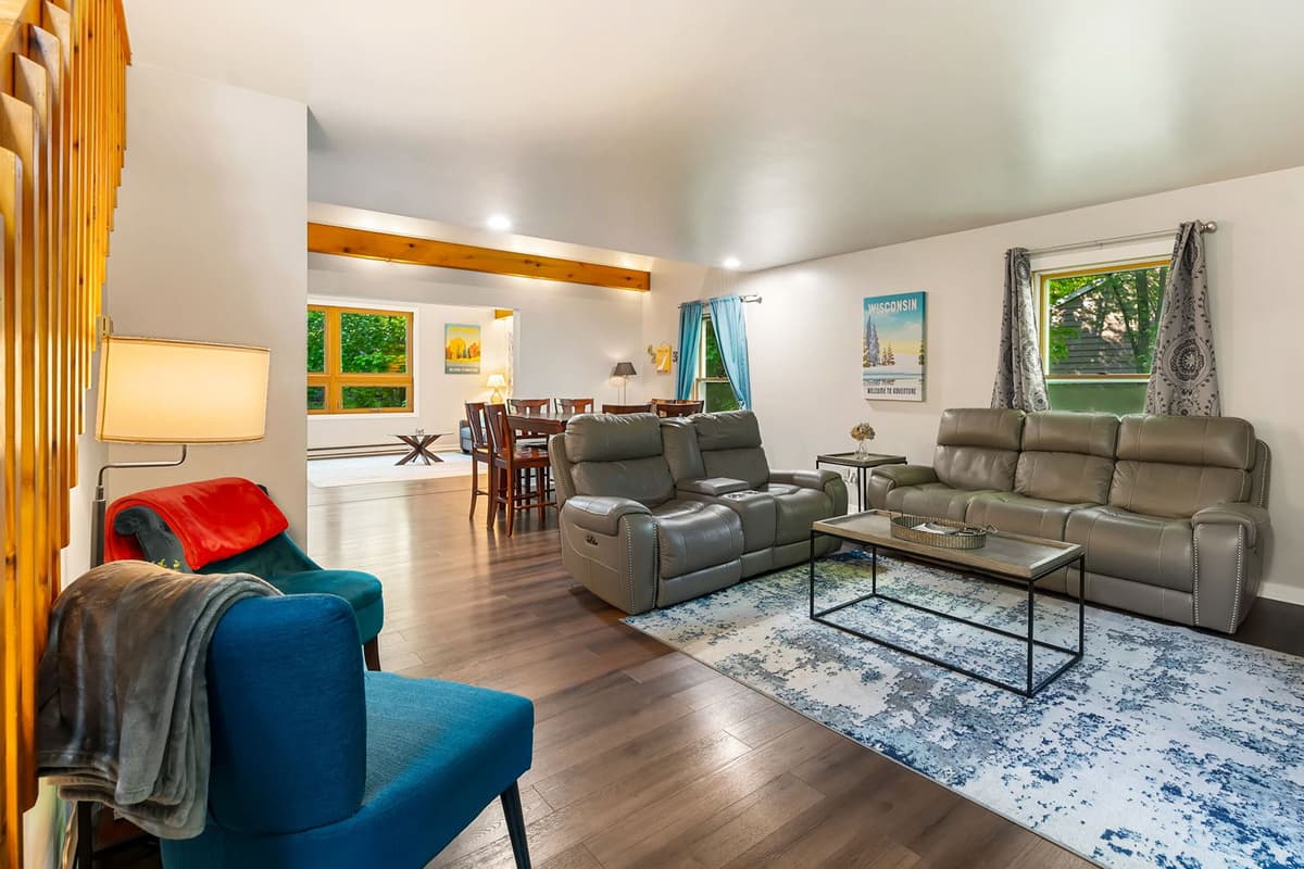 Kick back and relax in the inviting living area, where comfortable seating and a warm atmosphere make it easy to settle in.