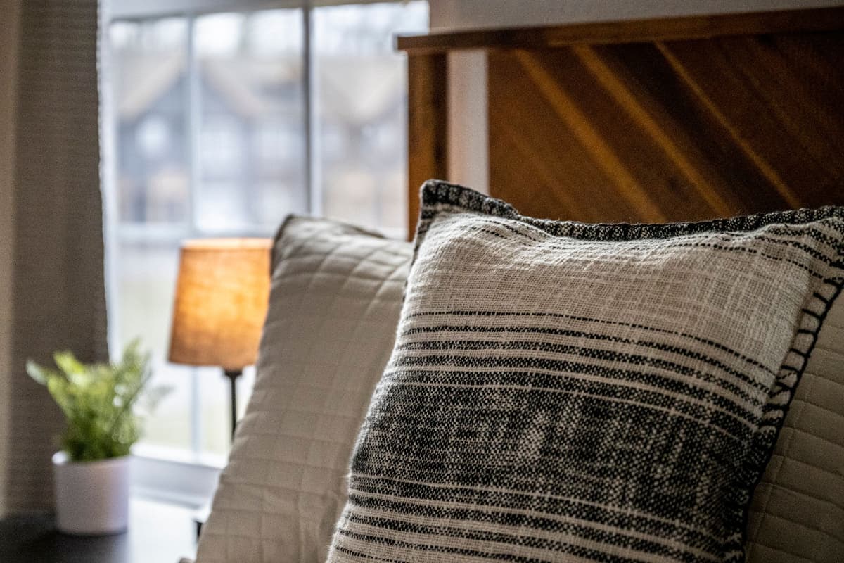 Soft, plush pillows and cozy linens create the perfect setup for a restful night.