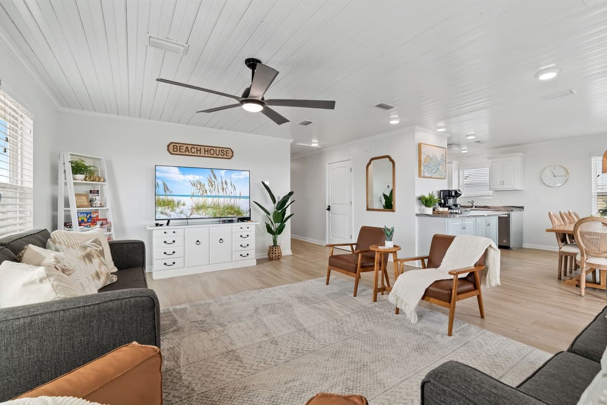 This inviting area seamlessly blends comfort and style, perfect for family gatherings and creating cherished memories.