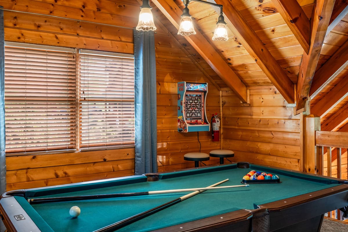 Let the games begin in your very own game room with a billiard table!