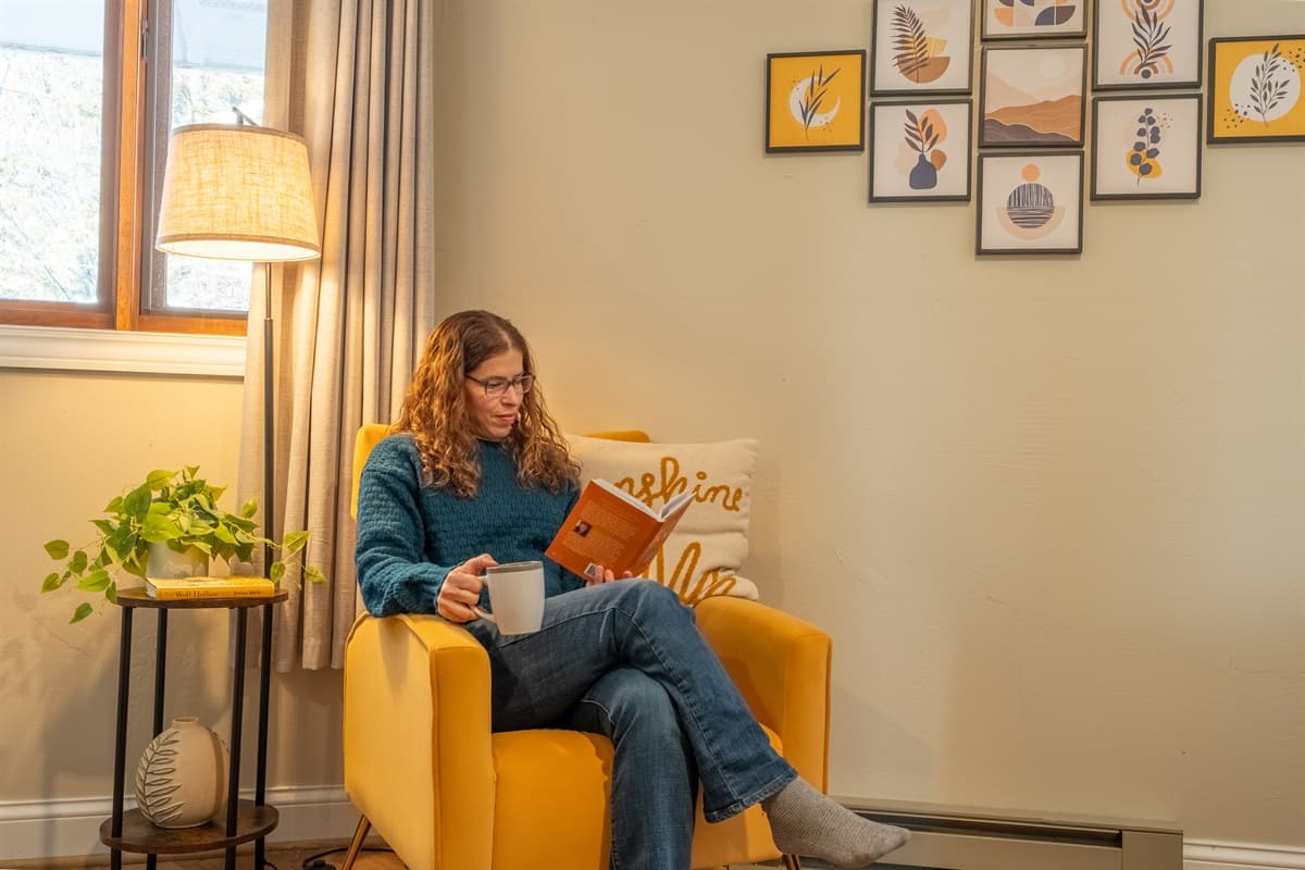 A perfect little reading nook in the bedroom—cozy up with a good book and relax!