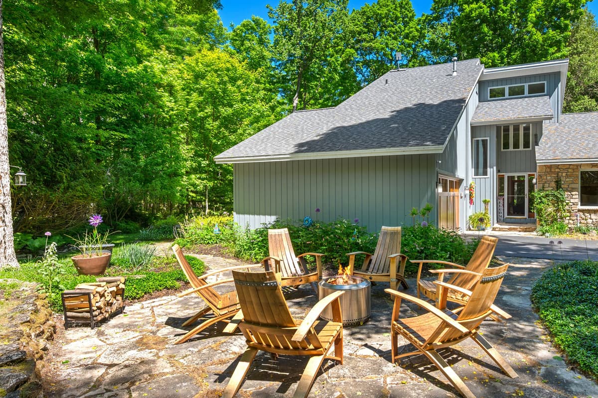 Gather around the outdoor fire pit and enjoy cozy evenings under the open sky.