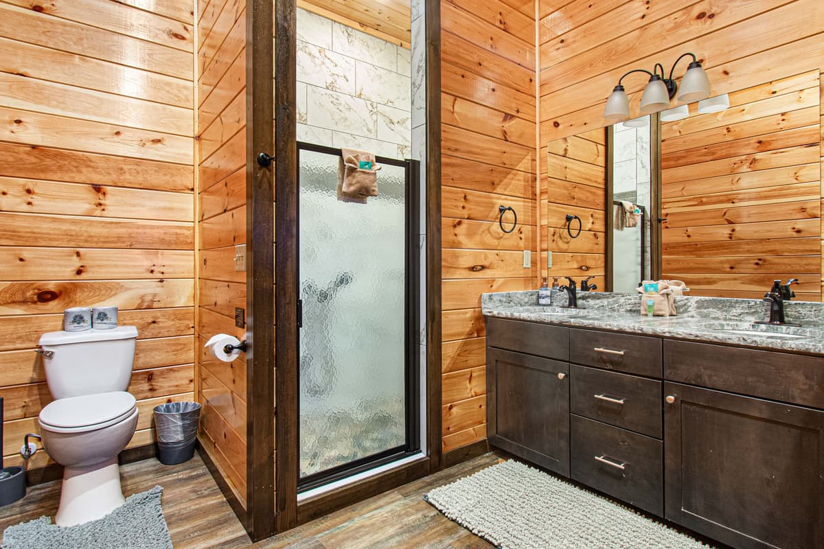Thoughtful finishes and a comfortable layout create a peaceful retreat just steps from the upstairs king bedroom.