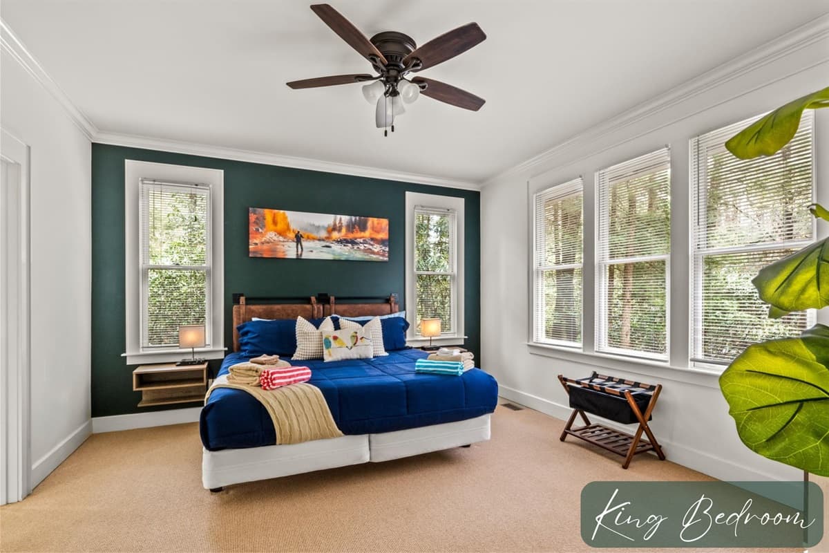 Spacious King Bedroom with Ceiling Fan, Large Windows and Forest Views
