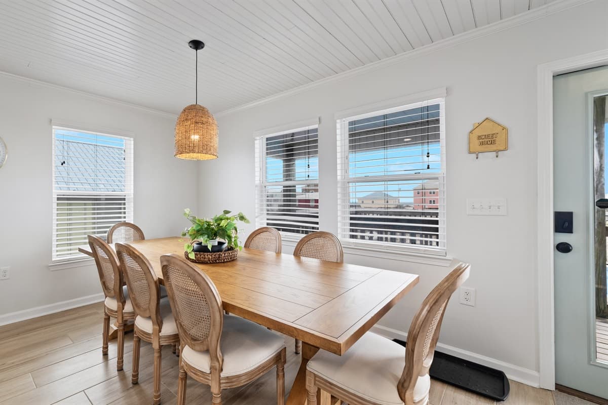 Escape the everyday and enjoy some beachside bliss with this beautiful ocean-view dining room! A perfect space to soak up the sun and dine in style.