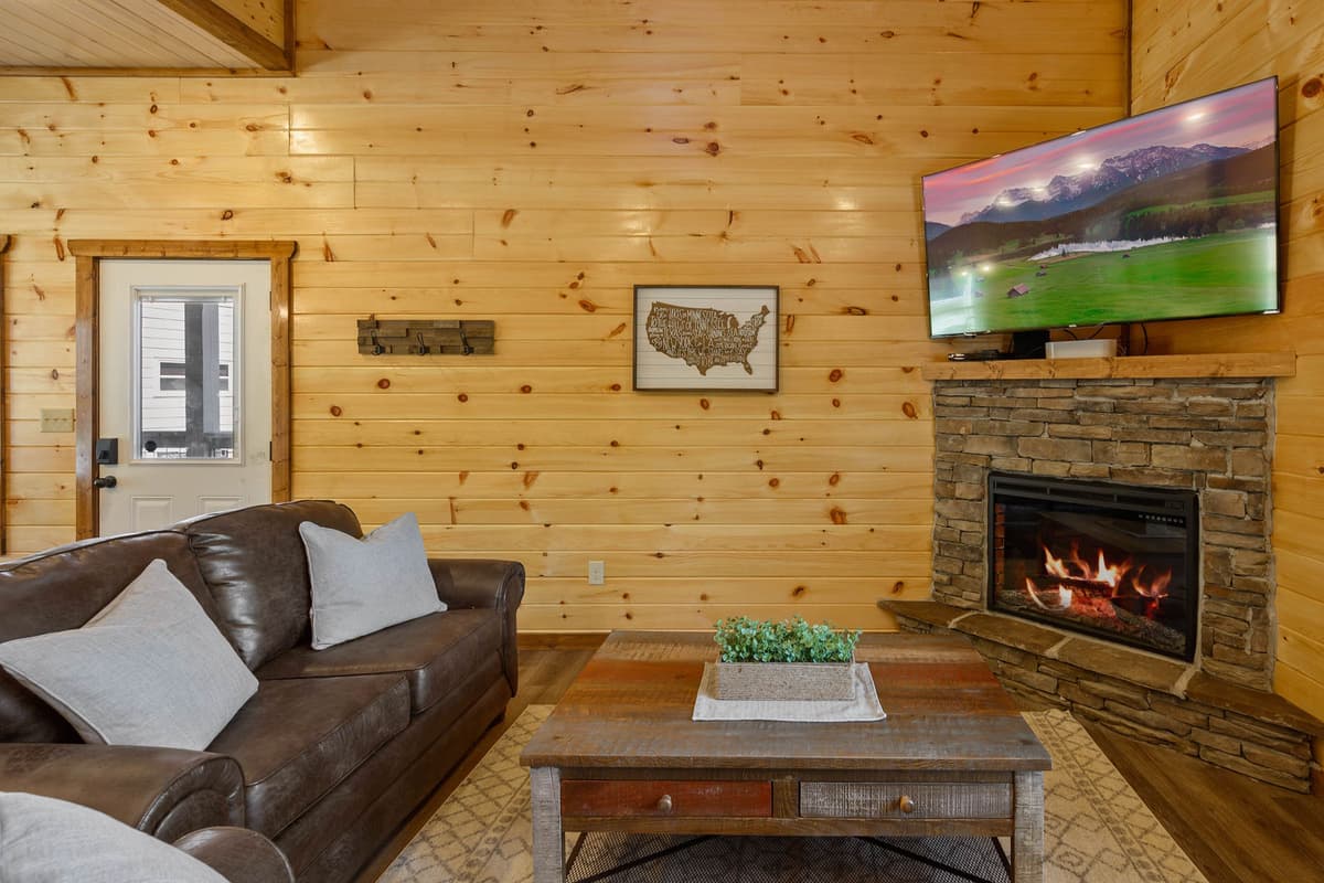 The fireplace adds an extra touch of warmth and charm to your cabin stay.