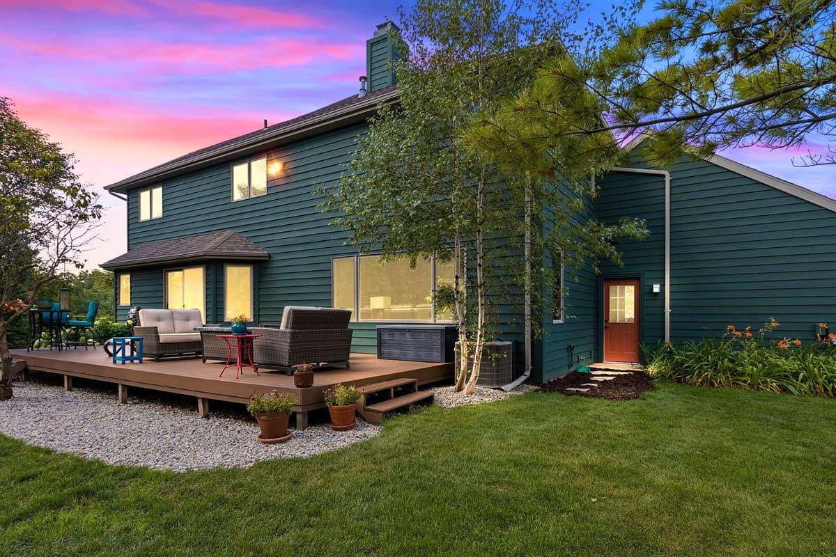 Patio paradise with a grill and cozy dining area, perfect for enjoying fresh air and delicious food.