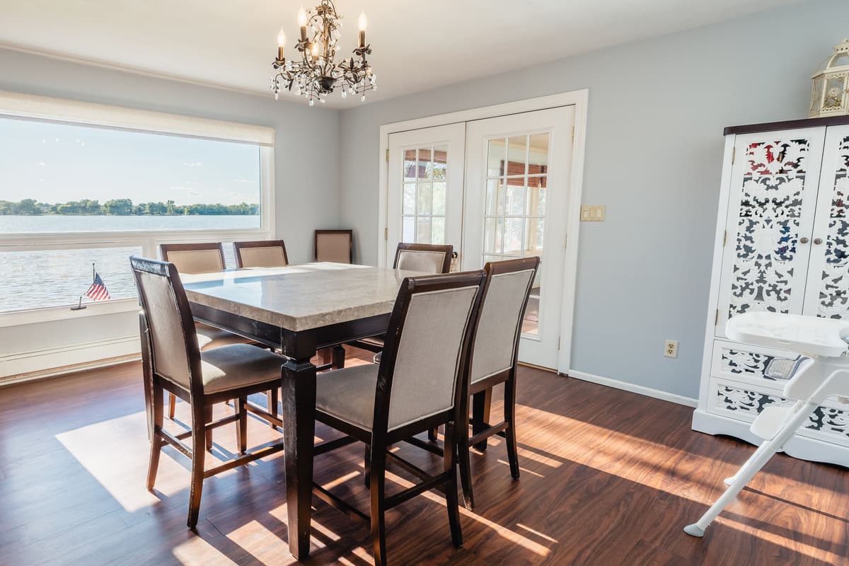 The spacious dining area comfortably seats up to eight guests, making it a great place for everyone to gather for meals.
