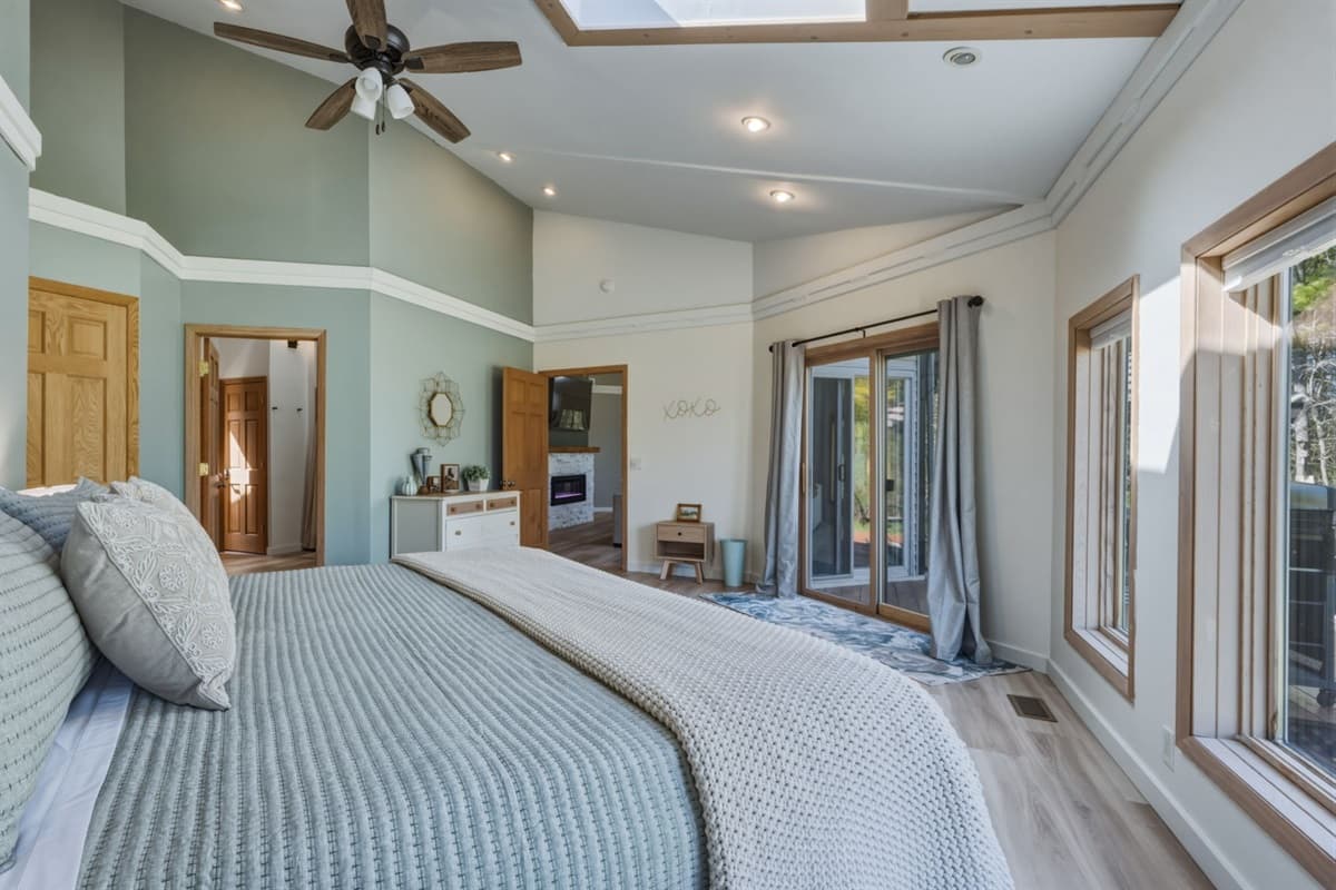 A bright and airy retreat designed for relaxation, offering a seamless connection between indoor comfort and fresh Door County air.