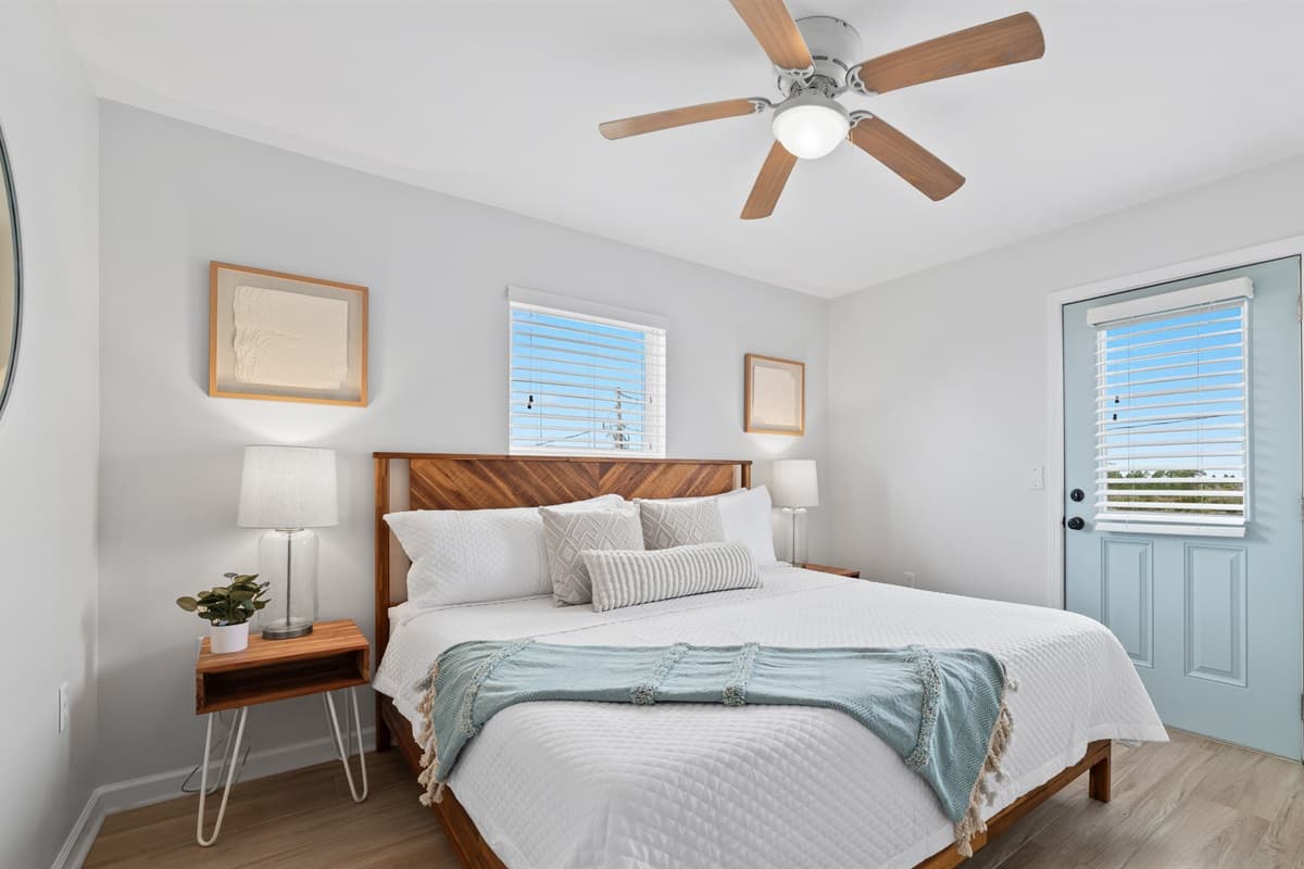 This inviting king bedroom offers a luxurious retreat, complete with plush bedding for a restful night's sleep.