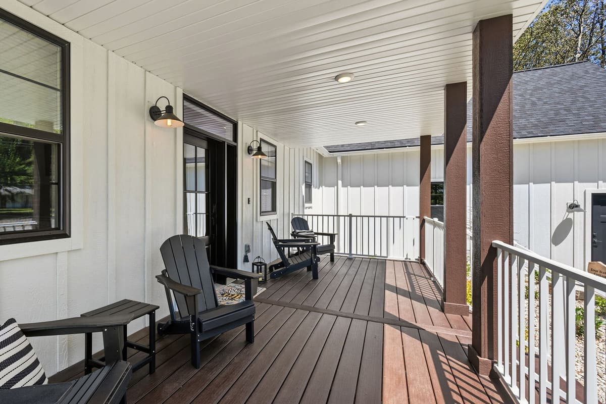 Enjoy the fresh air and peaceful surroundings from the comfortable seating on the porch. It’s the perfect spot to start your morning with a cup of coffee or unwind after a day of exploring Sister Bay.