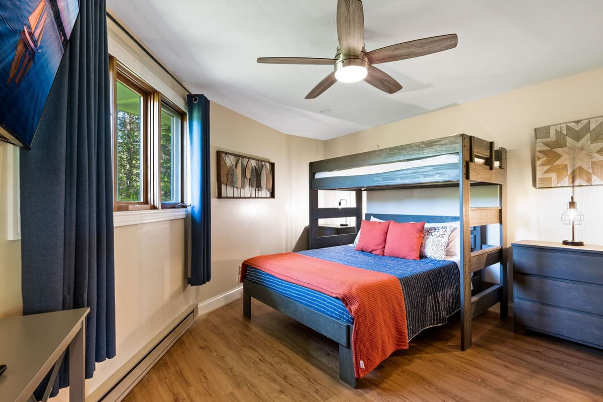 Enjoy a fun and comfortable sleeping setup with a twin-over-queen bunk bed.