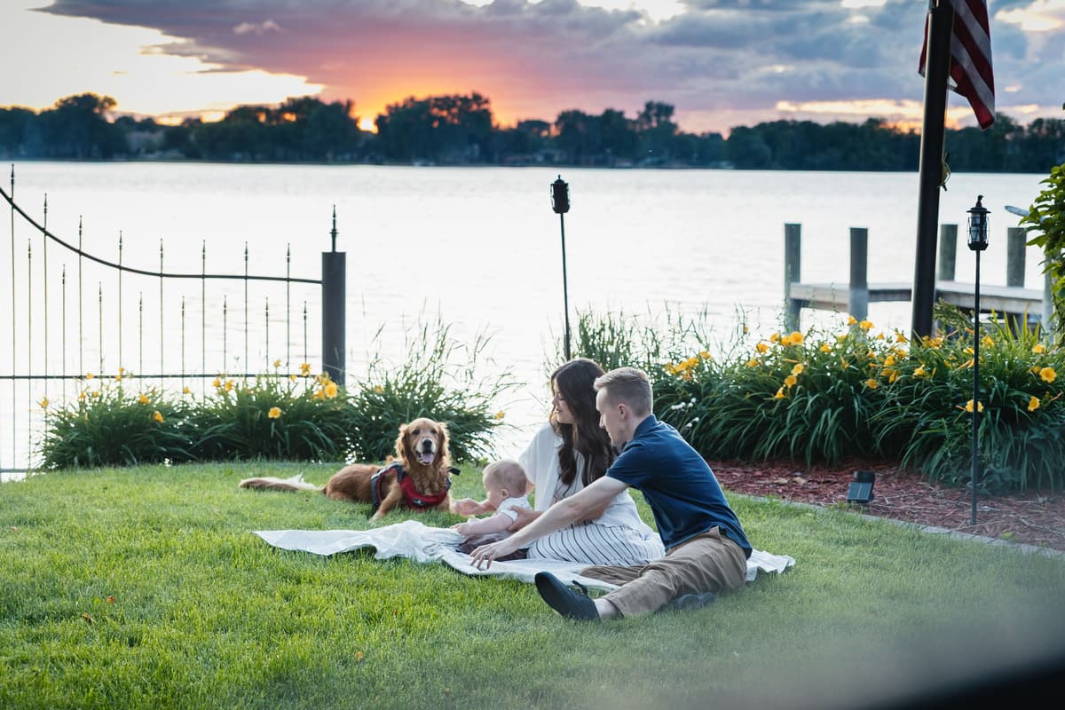 The peaceful lake provides a stunning backdrop as the sun begins to set.