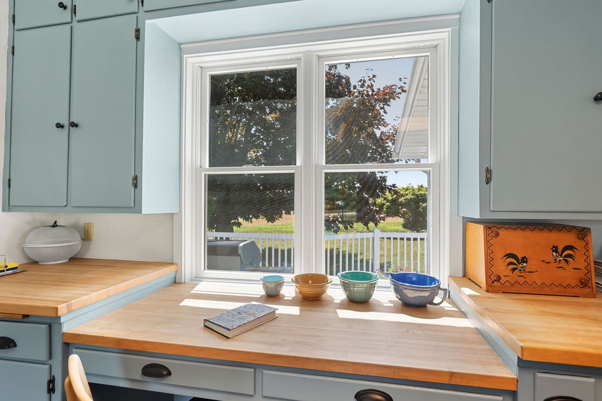 A convenient workspace tucked right into the kitchen makes it easy to stay productive during your getaway.