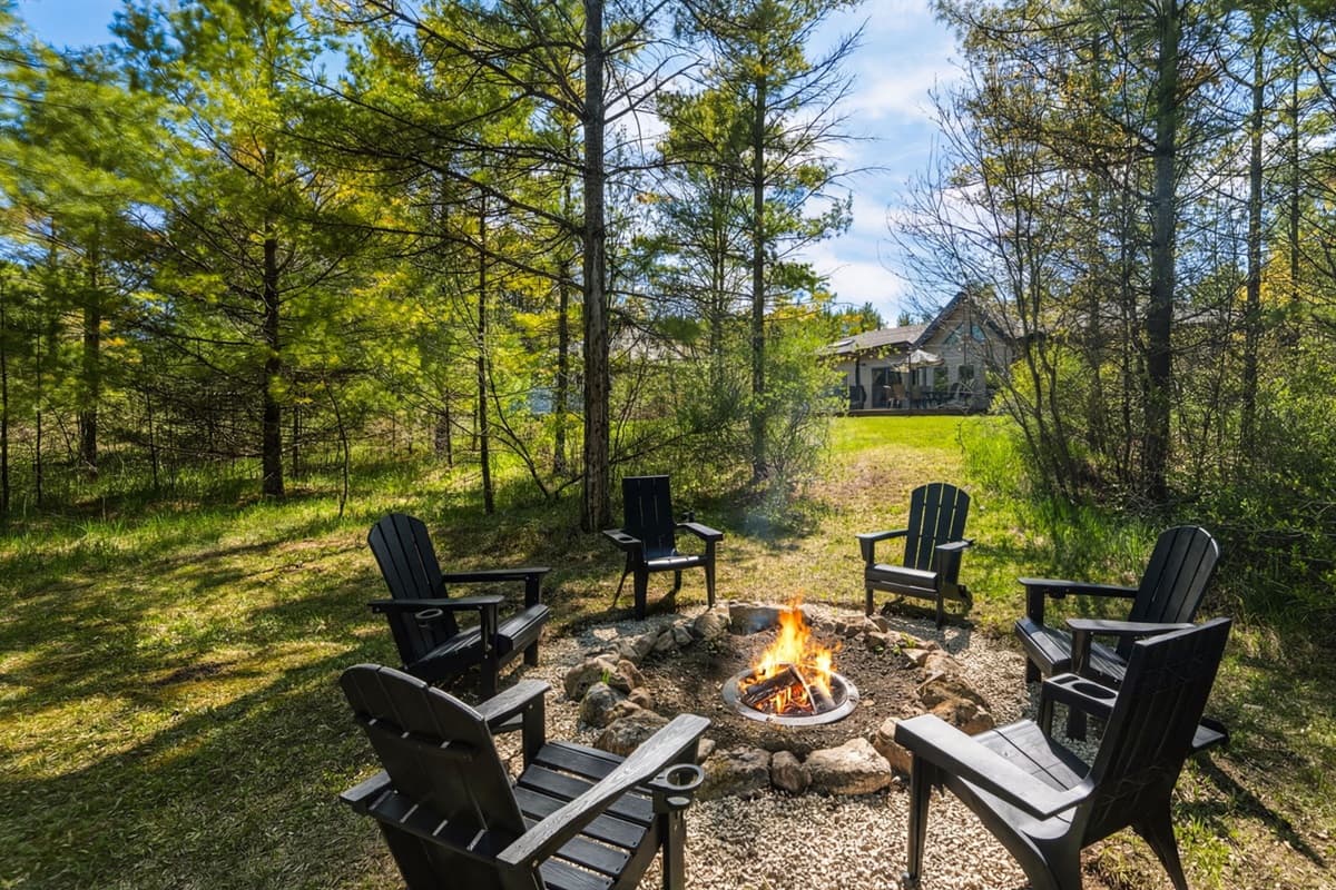 Outdoor firepit area perfect for cozy evenings under the stars. Gather around the fire to share stories, roast marshmallows, and enjoy the peaceful Door County nights in a warm and inviting setting.