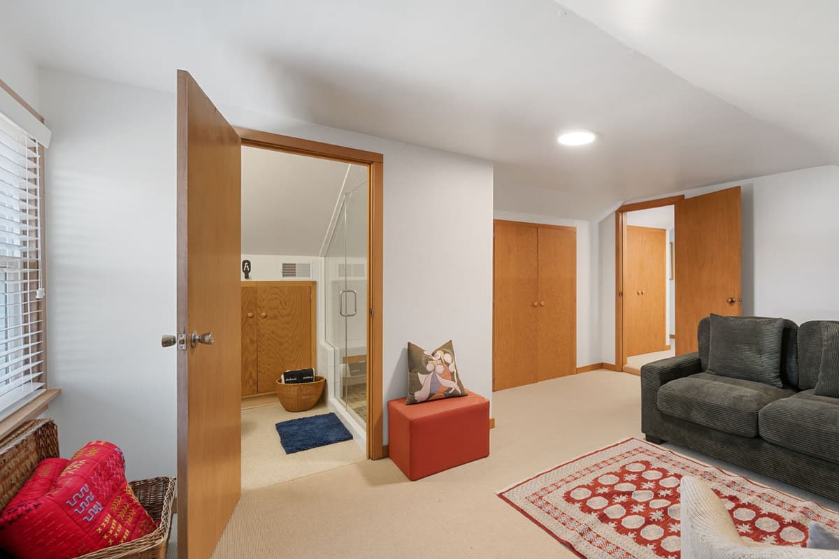 Settle in and relax in the cozy TV room, complete with comfortable seating for everyone.