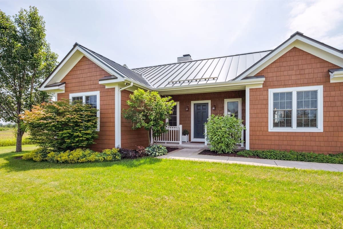 Charming home with plenty of outdoor space and a welcoming entrance.