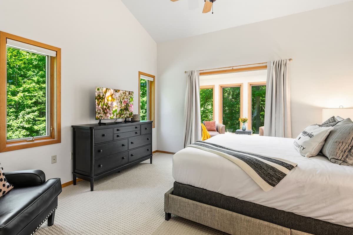 The bedroom features a warm and welcoming atmosphere, perfect for unwinding after a day of exploring.