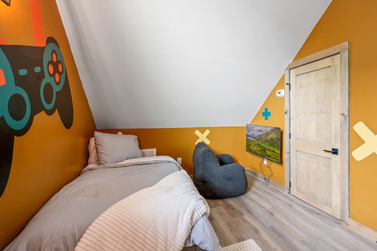 The room features two trundle beds, providing comfortable and flexible sleeping arrangements for extra guests.