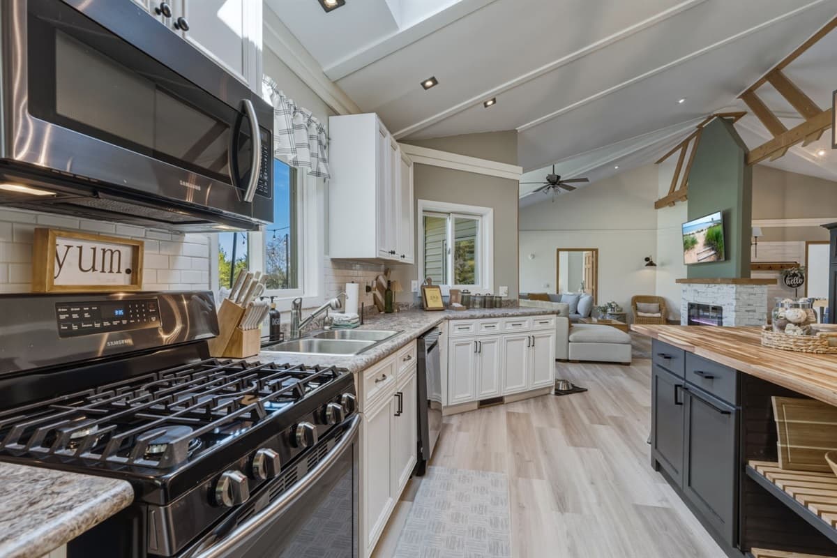 Large, spacious kitchen designed for easy cooking and gathering, with plenty of room to prep meals, share snacks, and enjoy time together.