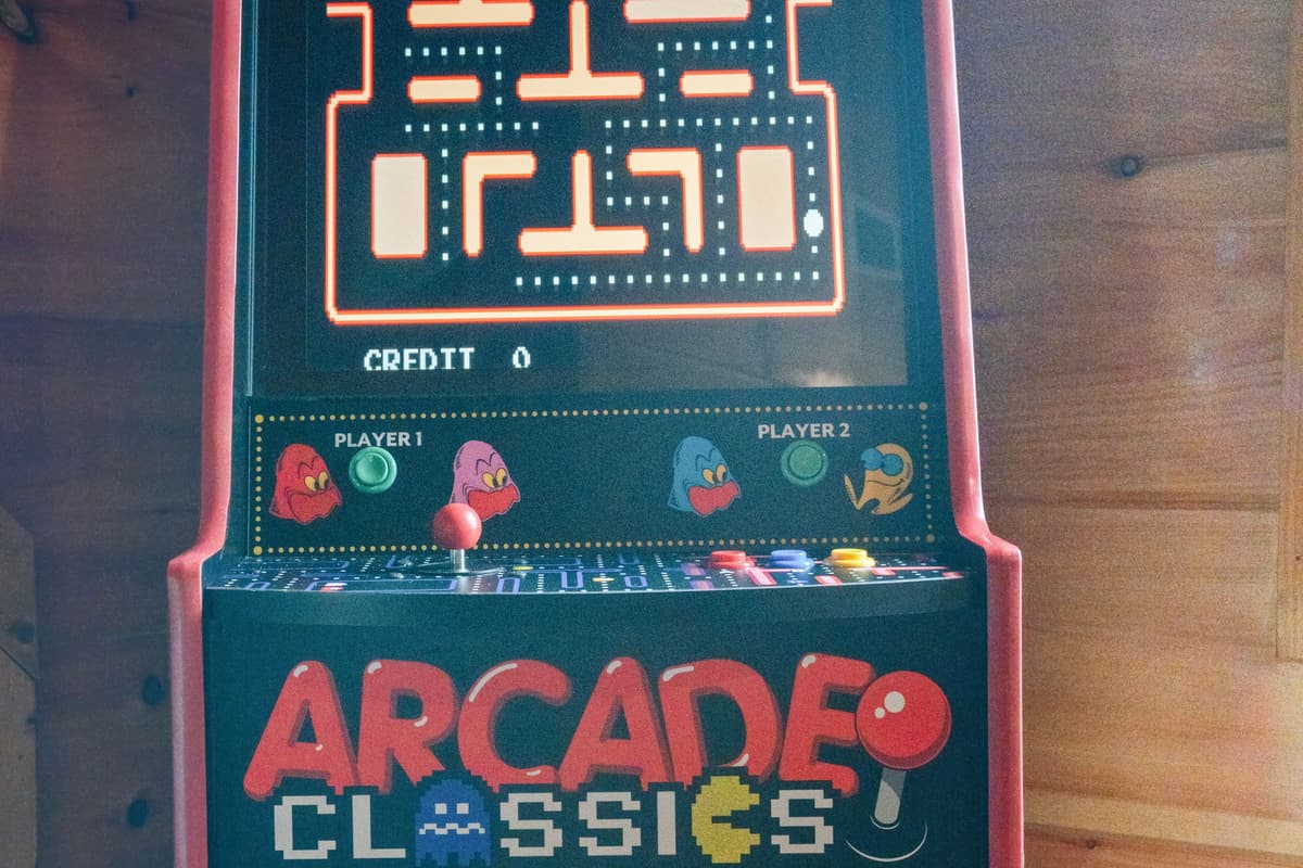 Test your skills on the arcade machine and see who can claim the high score.