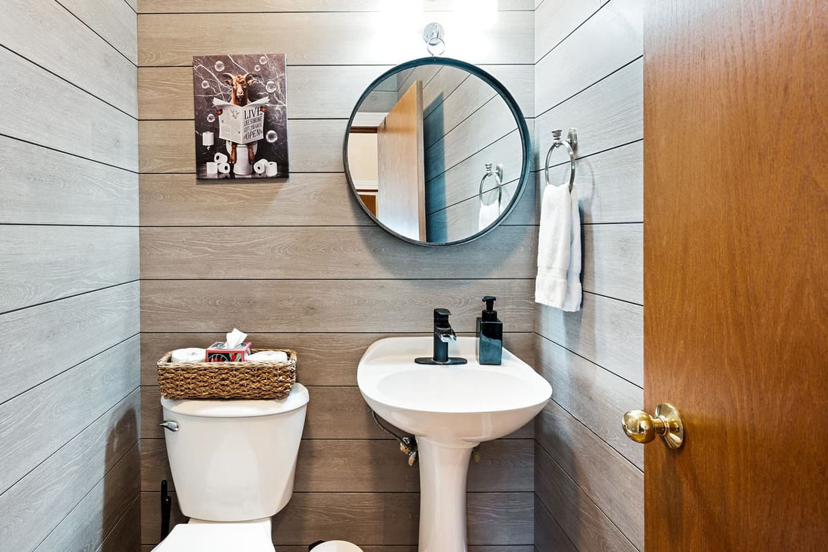 A convenient half bathroom is located near the main living areas.