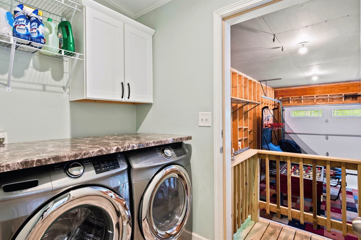 Transform laundry day into a breeze in your sleek laundry laboratory. Equipped with modern amenities, it's where efficiency meets convenience, making chores a delight.