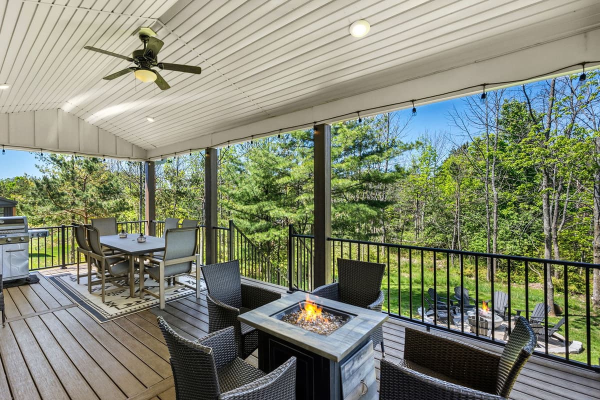 After dinner, gather around the separate fire table and settle into the comfortable seating. The warmth of the fire creates a cozy atmosphere as the evening cools down.