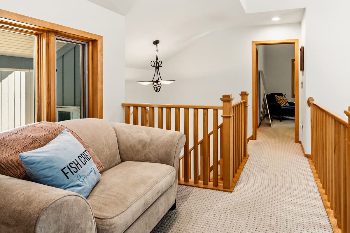 Head upstairs to discover additional bedrooms and spaces designed for relaxing.