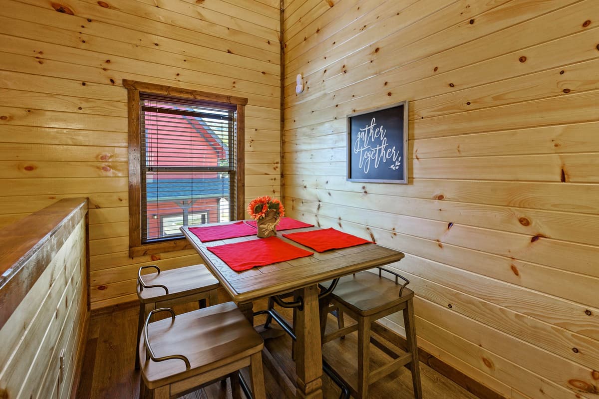 A table with seating for four provides the perfect spot for board games, cards, puzzles, and more.