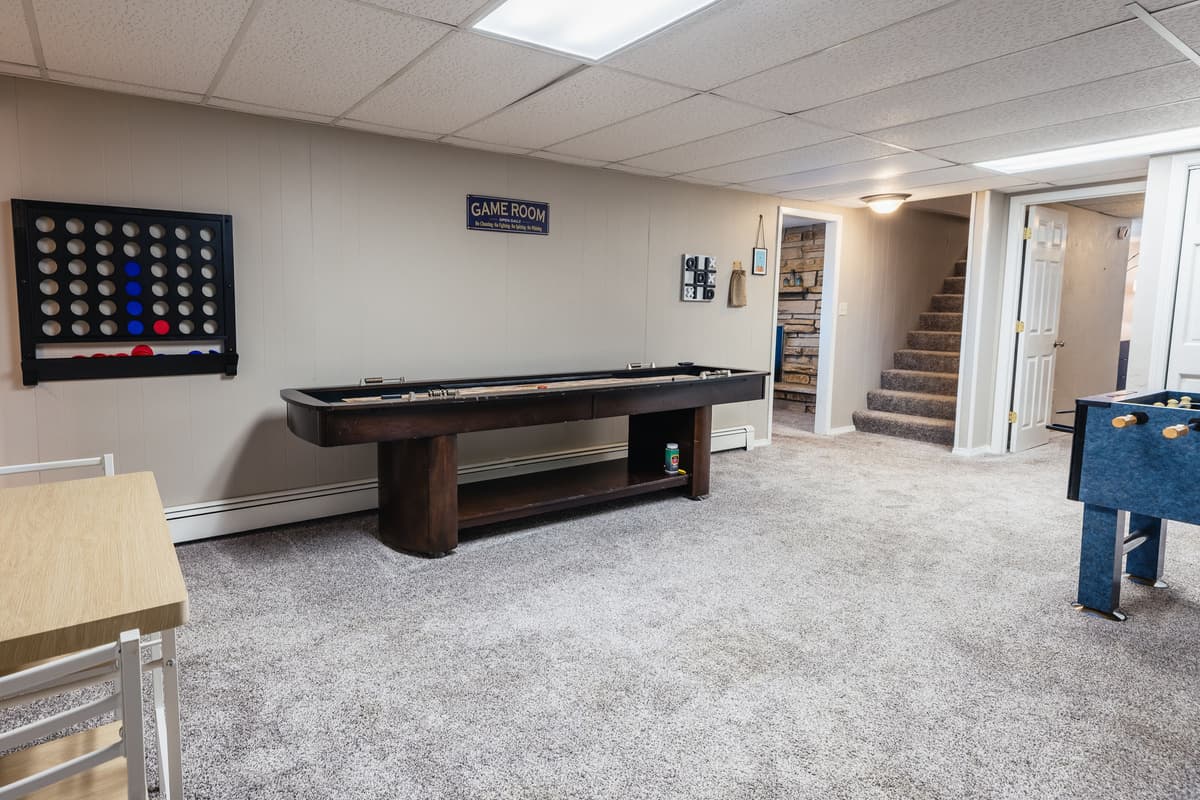 The game room is the perfect spot for some friendly competition and quality time together.